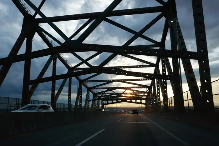 Cars drive over the Newark Bay Bridge, also known as the Vincent R. Casciano Memorial Bridge, in 2021. The bridge would be replaced in conjunction with a a plan to widen the New Jersey Turnpike’s Husdon extension.